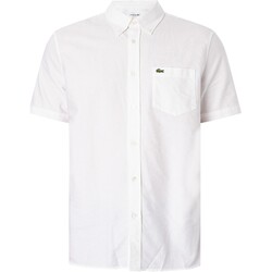 Textiel Heren Overhemden korte mouwen Lacoste Normaal overhemd met korte mouwen en logo Wit
